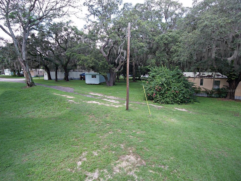 28313 Highway 27 Leesburg, FL 34748 - Photo 34 of 46 a view of a house with a yard