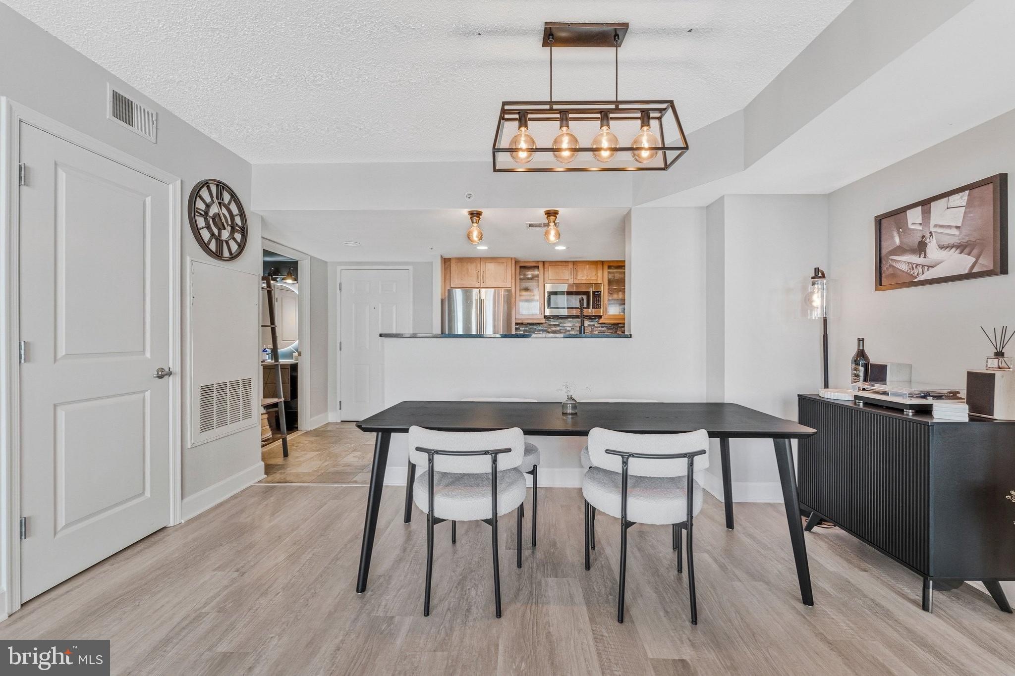 11800 Sunset Hills Road, Unit 826 Reston, VA 20190 - Photo 14 of 61 Dining area off the kitchen