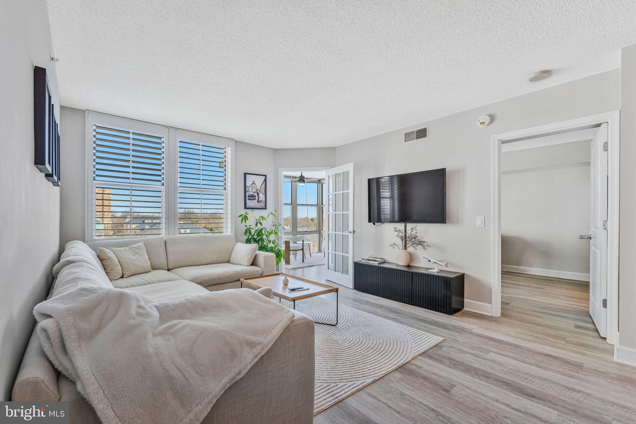 11800 Sunset Hills Road, Unit 826 Reston, VA 20190 - Photo 2 of 61 Bright and open living area