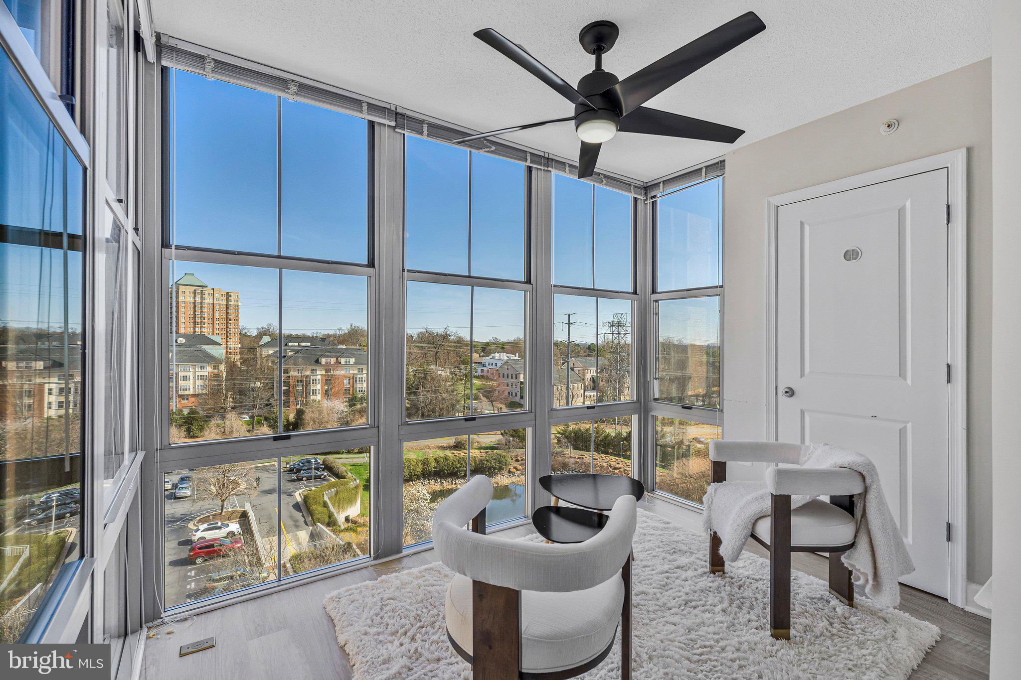 11800 Sunset Hills Road, Unit 826 Reston, VA 20190 - Photo 5 of 61 Stunning sun room overlooking the pond