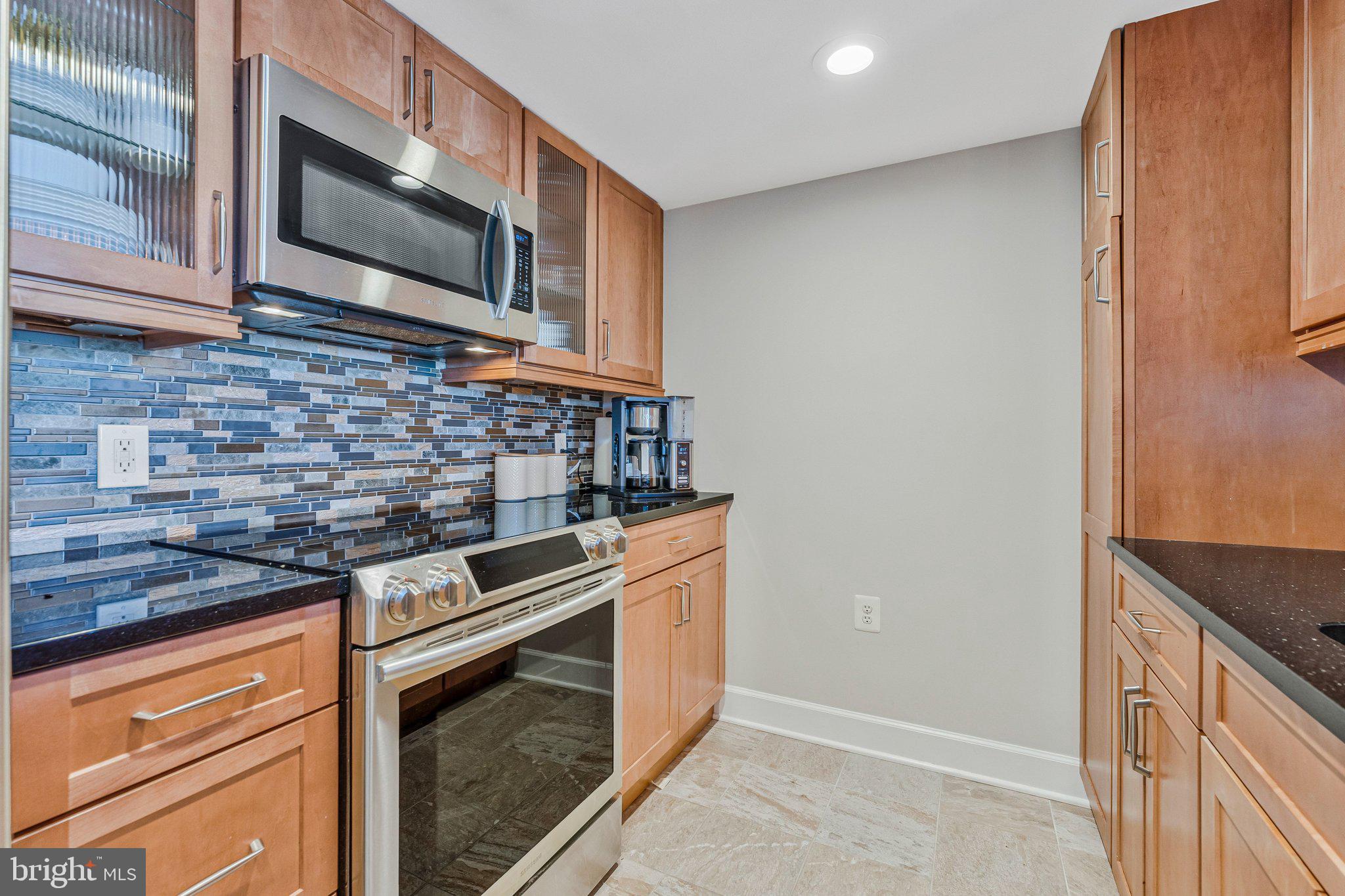 11800 Sunset Hills Road, Unit 826 Reston, VA 20190 - Photo 10 of 61 Granite countertops & tile backsplash