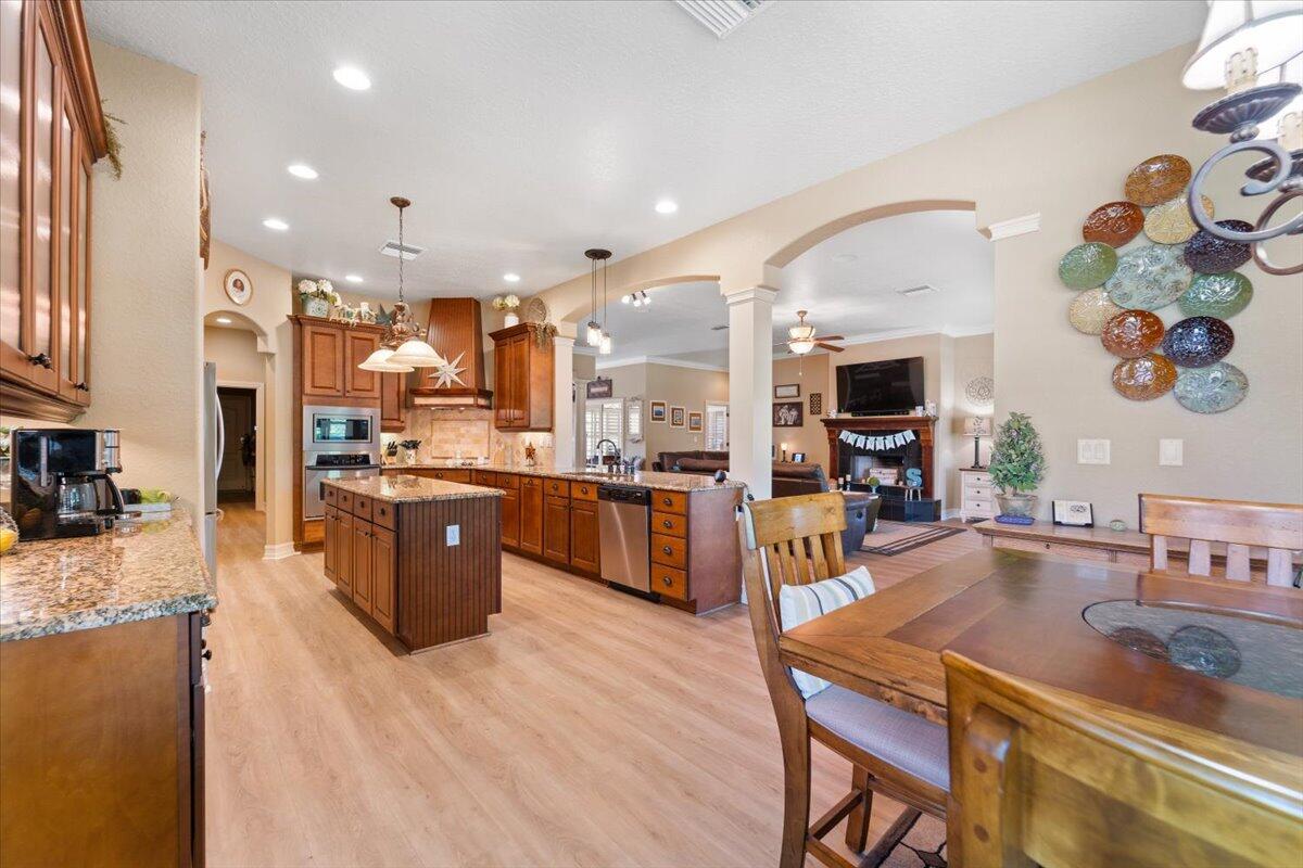 3260 Quantum Place Mims, FL 32754 - Photo 15 of 30 a large kitchen with lots of counter space and windows