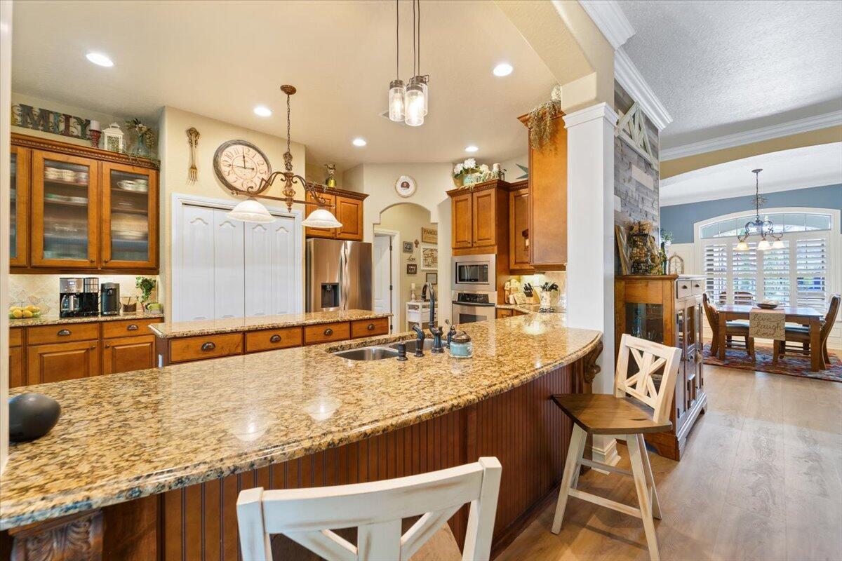 3260 Quantum Place Mims, FL 32754 - Photo 17 of 30 a bathroom with a granite countertop sink and a large mirror