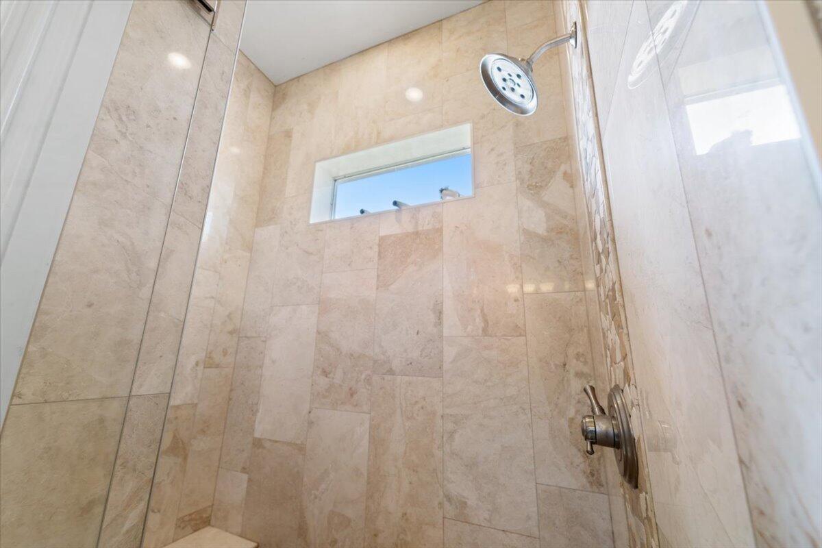 3260 Quantum Place Mims, FL 32754 - Photo 22 of 30 a bathroom with a shower