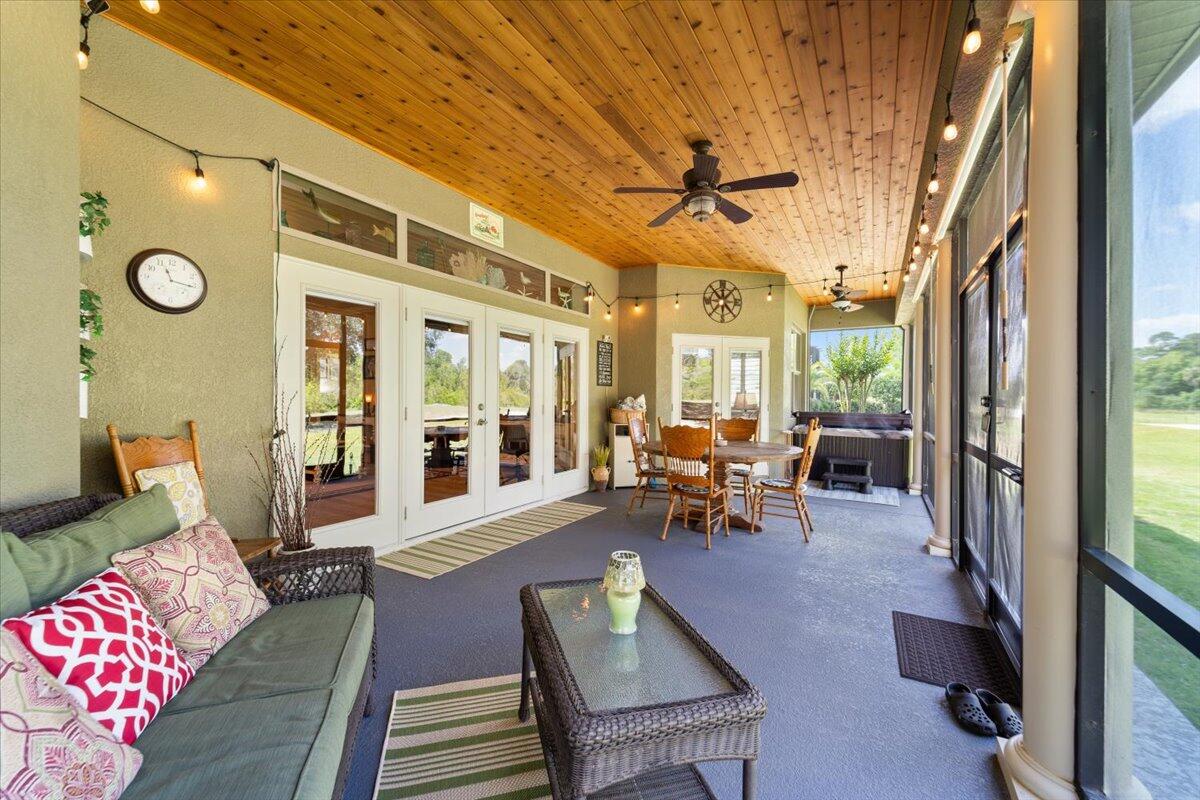 3260 Quantum Place Mims, FL 32754 - Photo 30 of 30 a living room with furniture and a large window