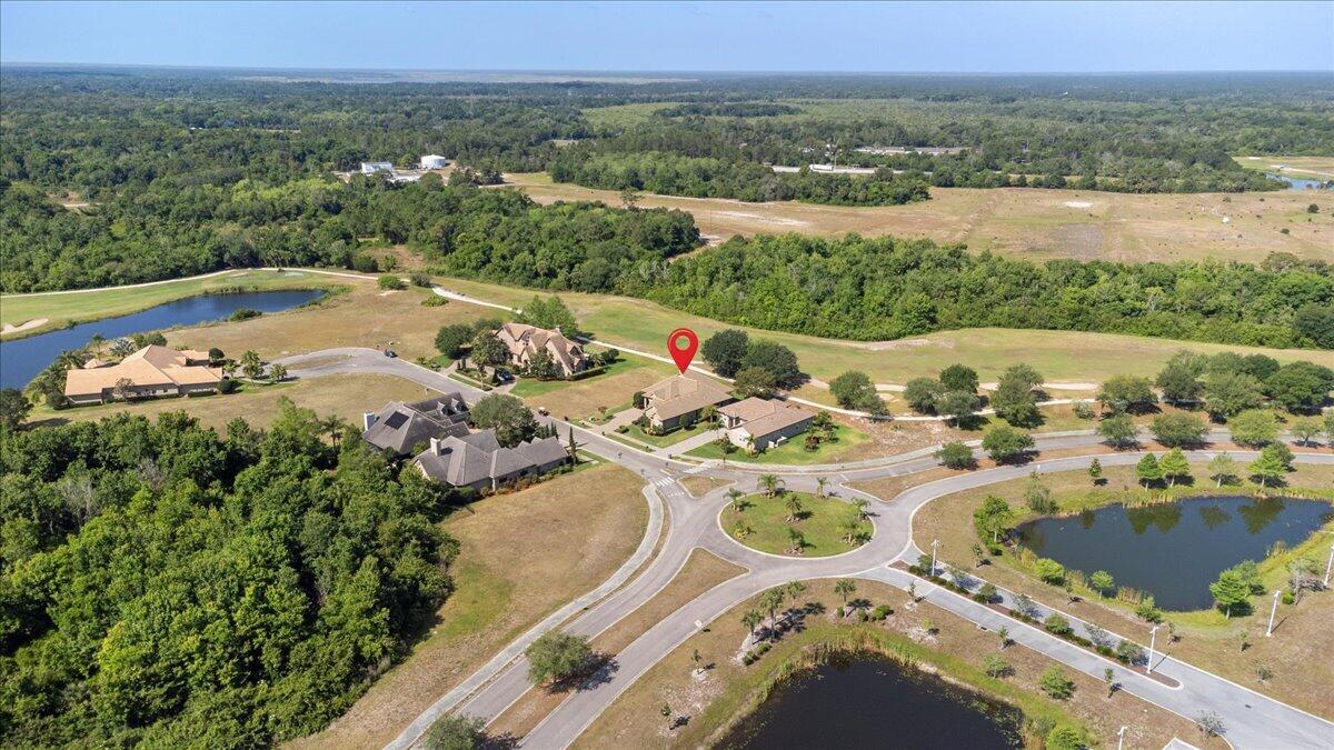 3260 Quantum Place Mims, FL 32754 - Photo 3 of 30 an aerial view of a house with outdoor space