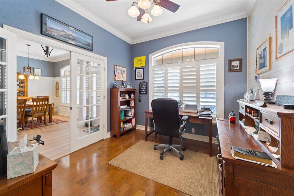 3260 Quantum Place Mims, FL 32754 - Photo 8 of 30 a view of a workspace with furniture and a window