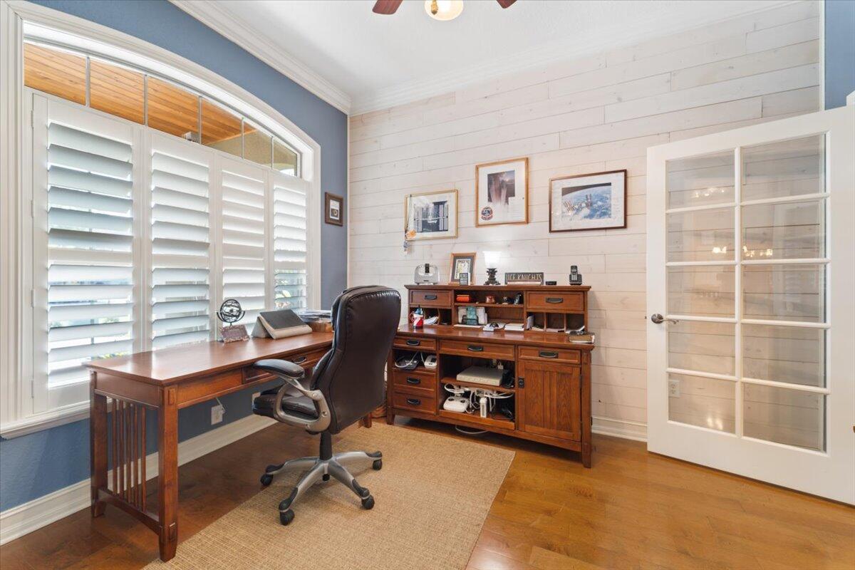 3260 Quantum Place Mims, FL 32754 - Photo 9 of 30 a view of a workspace with furniture and a window
