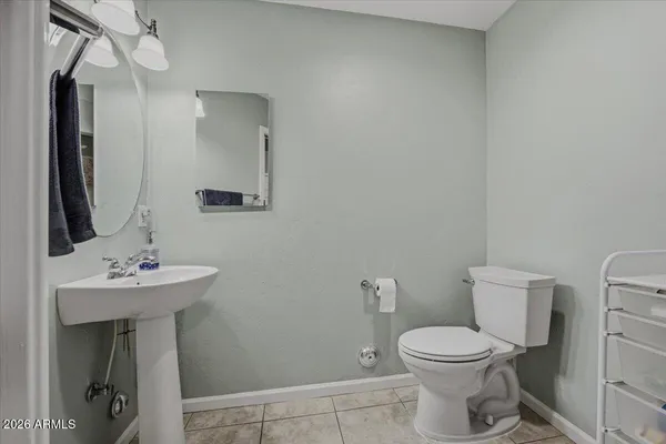 a kitchen with a sink a stove and refrigerator