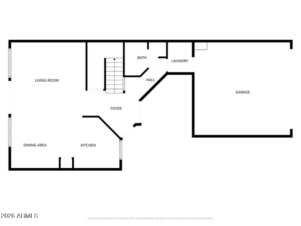 a view of a patio with table and chairs