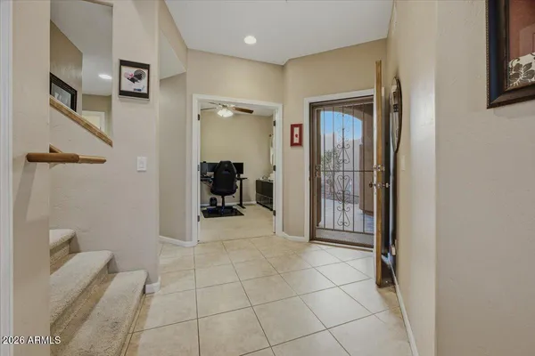 a view of an empty room with windows