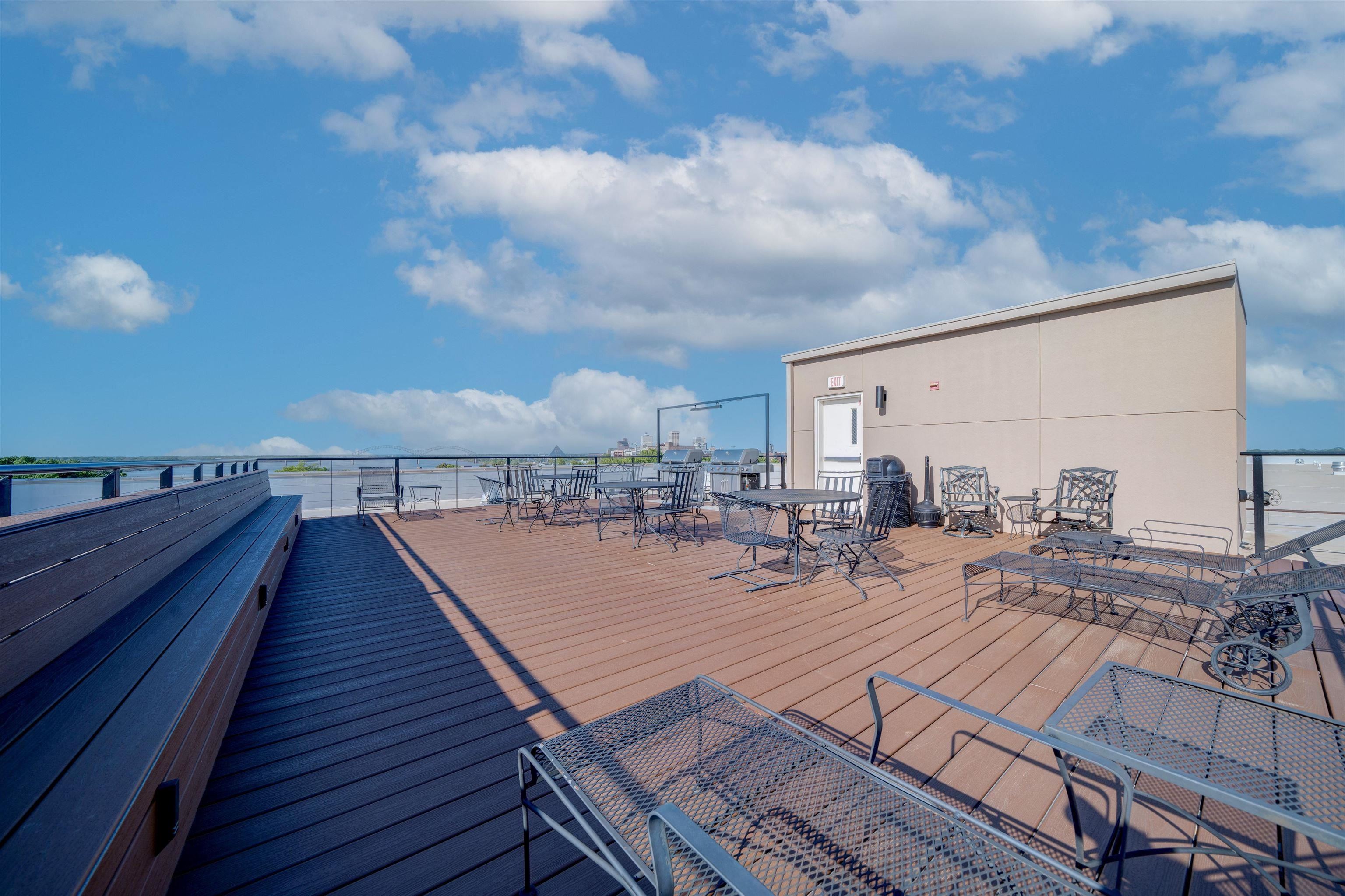 648 Riverside Drive, Unit 213 Memphis, TN 38103 - Photo 24 of 25 a view of a terrace with sitting area