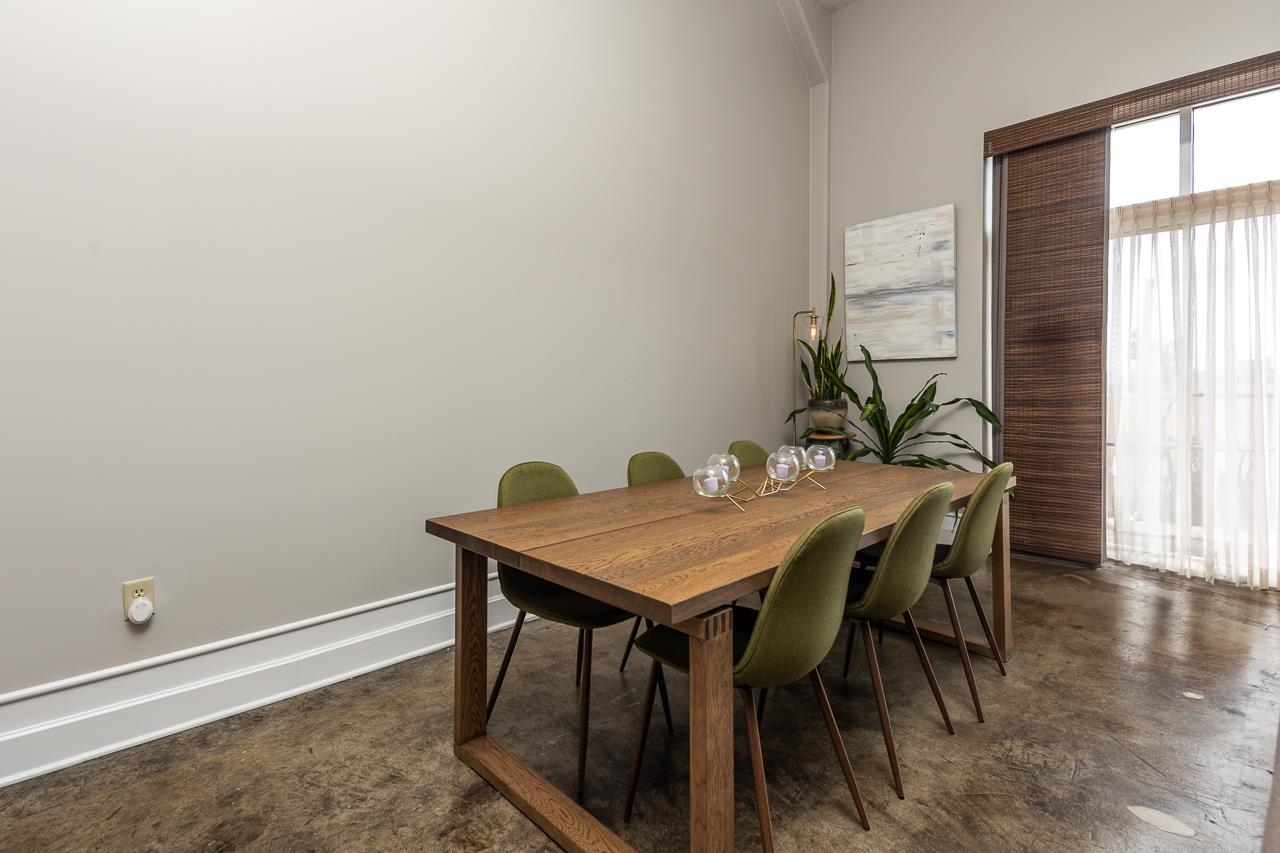 648 Riverside Drive, Unit 213 Memphis, TN 38103 - Photo 10 of 25 a view of a workspace with furniture and window