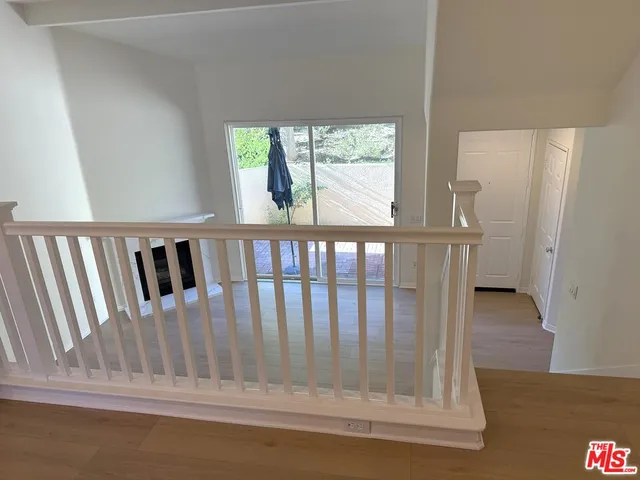 a view of entryway with a door