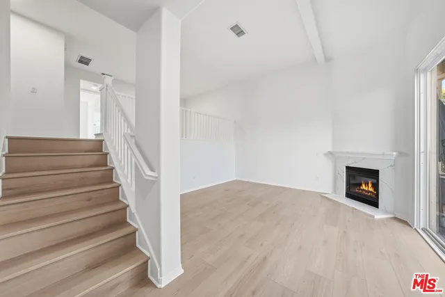 a bathroom with a sink a vanity and a mirror
