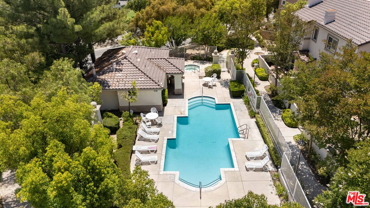25715 Wagner Way, Unit B Stevenson Ranch, CA 91381 - Photo 3 of 24 an aerial view of a house with a yard