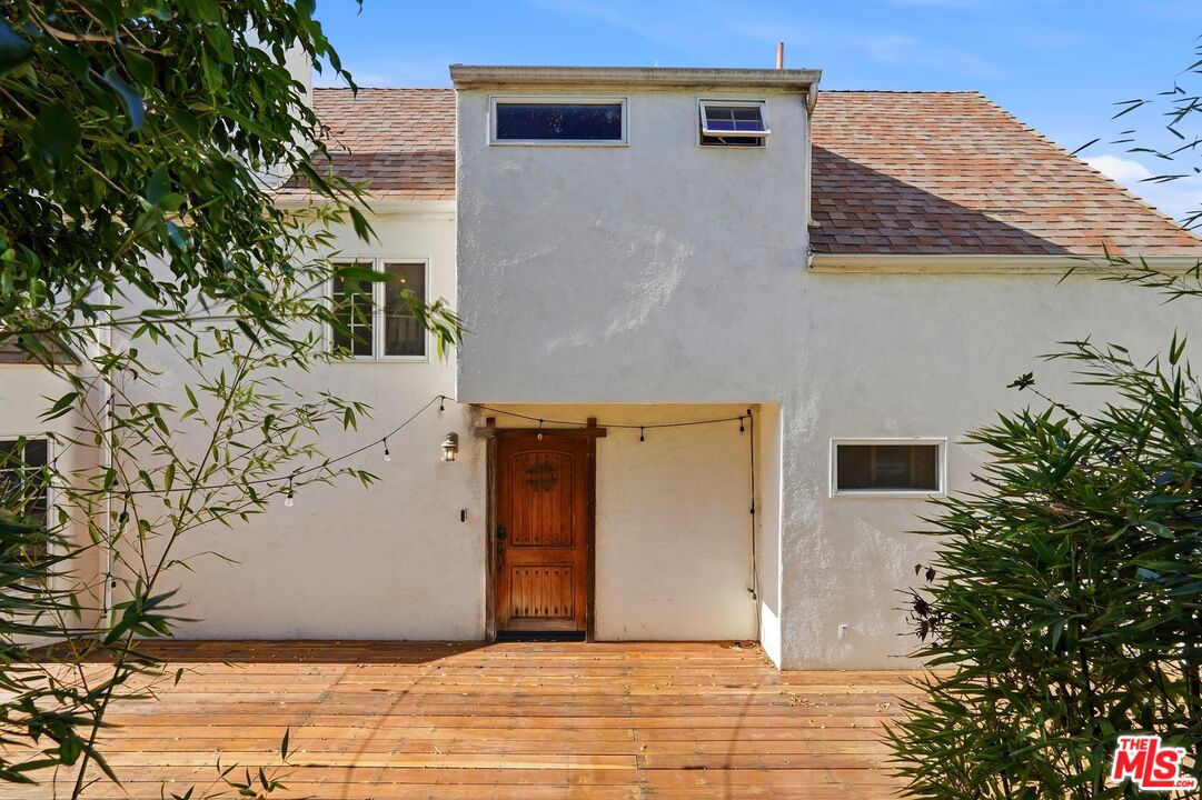 2955 Corral Canyon Road Malibu, CA 90265 - Photo 2 of 21 a view of a house with a tree