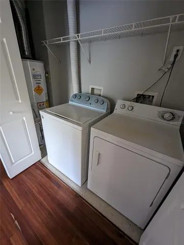 a utility room with dryer and washer