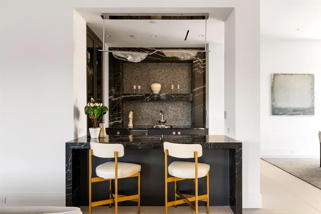 a kitchen with a stove and a table