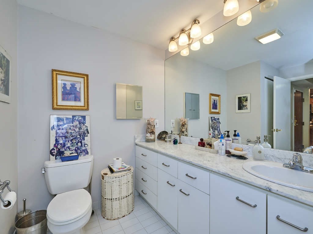 3 Seal Harbor Road, Unit 744 Winthrop, MA 02152 - Photo 15 of 30 a bathroom with a toilet sink and mirror
