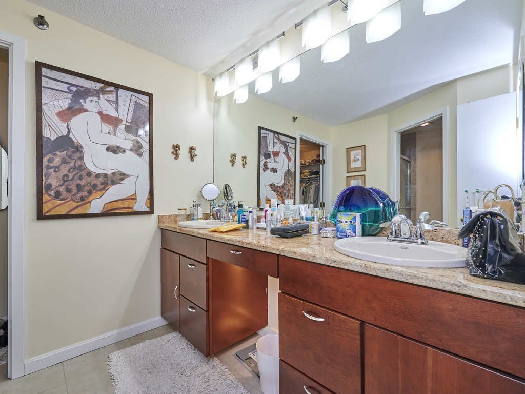 3 Seal Harbor Road, Unit 744 Winthrop, MA 02152 - Photo 17 of 30 a spacious bathroom with a granite countertop sink a large mirror and vanity
