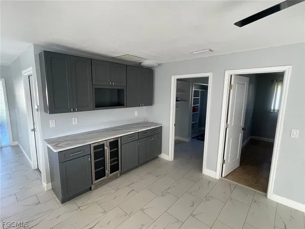 a kitchen with stainless steel appliances a stove and a refrigerator
