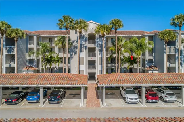 a view of a car parked in front of a building