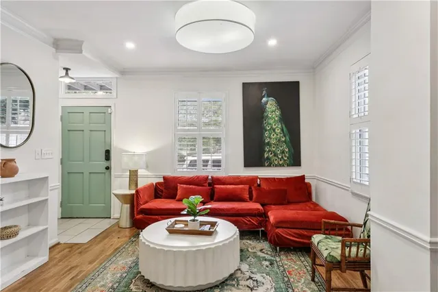 a living room with furniture and a window
