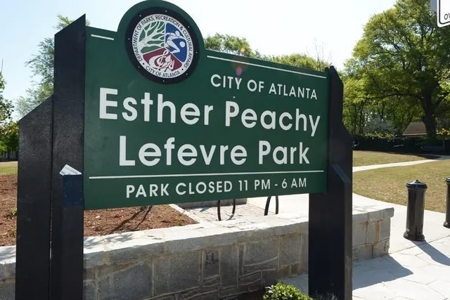 a view of outdoor space with signage and flags