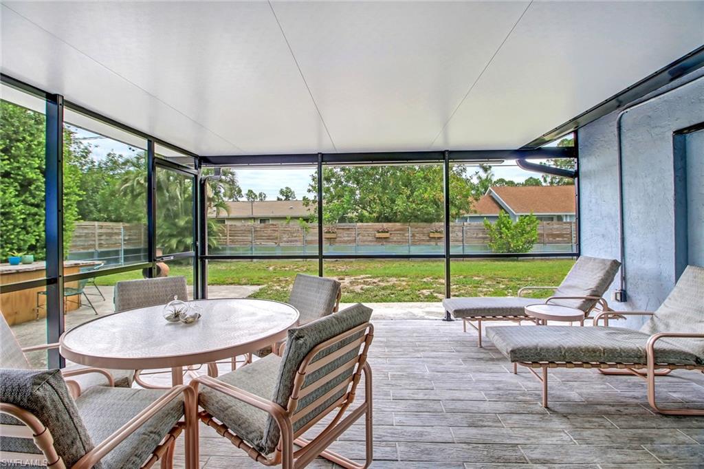 17405 Lebanon Road Fort Myers, FL 33967 - Photo 20 of 26 Large covered lanai with new tile and roof