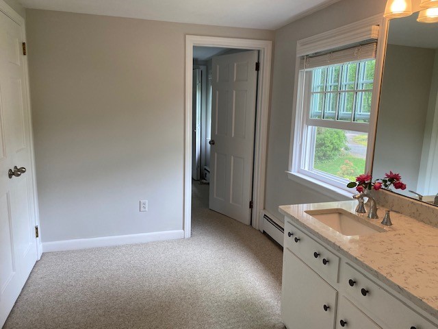 27 Lee Road Barrington, RI 02806 - Photo 11 of 18 master bath leading to dressing room with his and hers closests