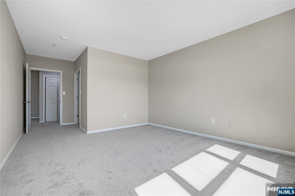 905 River Road, Unit 309 Edgewater, NJ 07020 - Photo 11 of 32 a view of an empty room