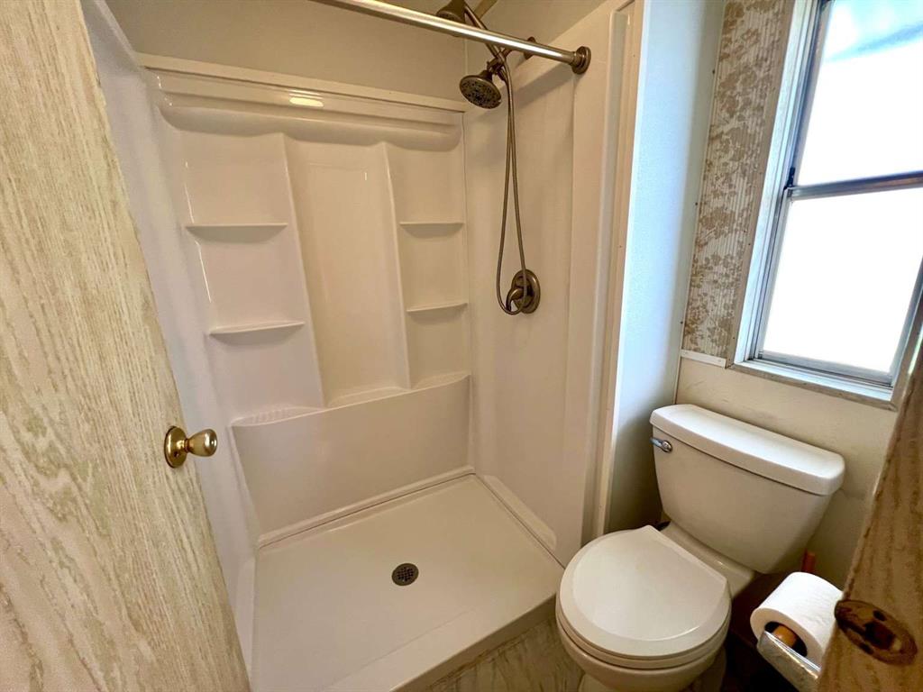 4266 Bob White Drive Boynton Beach, FL 33436 - Photo 14 of 24 a white toilet sitting next to a shower