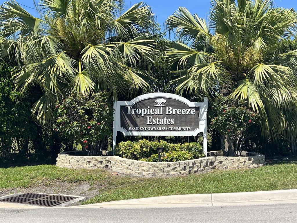 4266 Bob White Drive Boynton Beach, FL 33436 - Photo 19 of 24 a sign that is on a brick wall