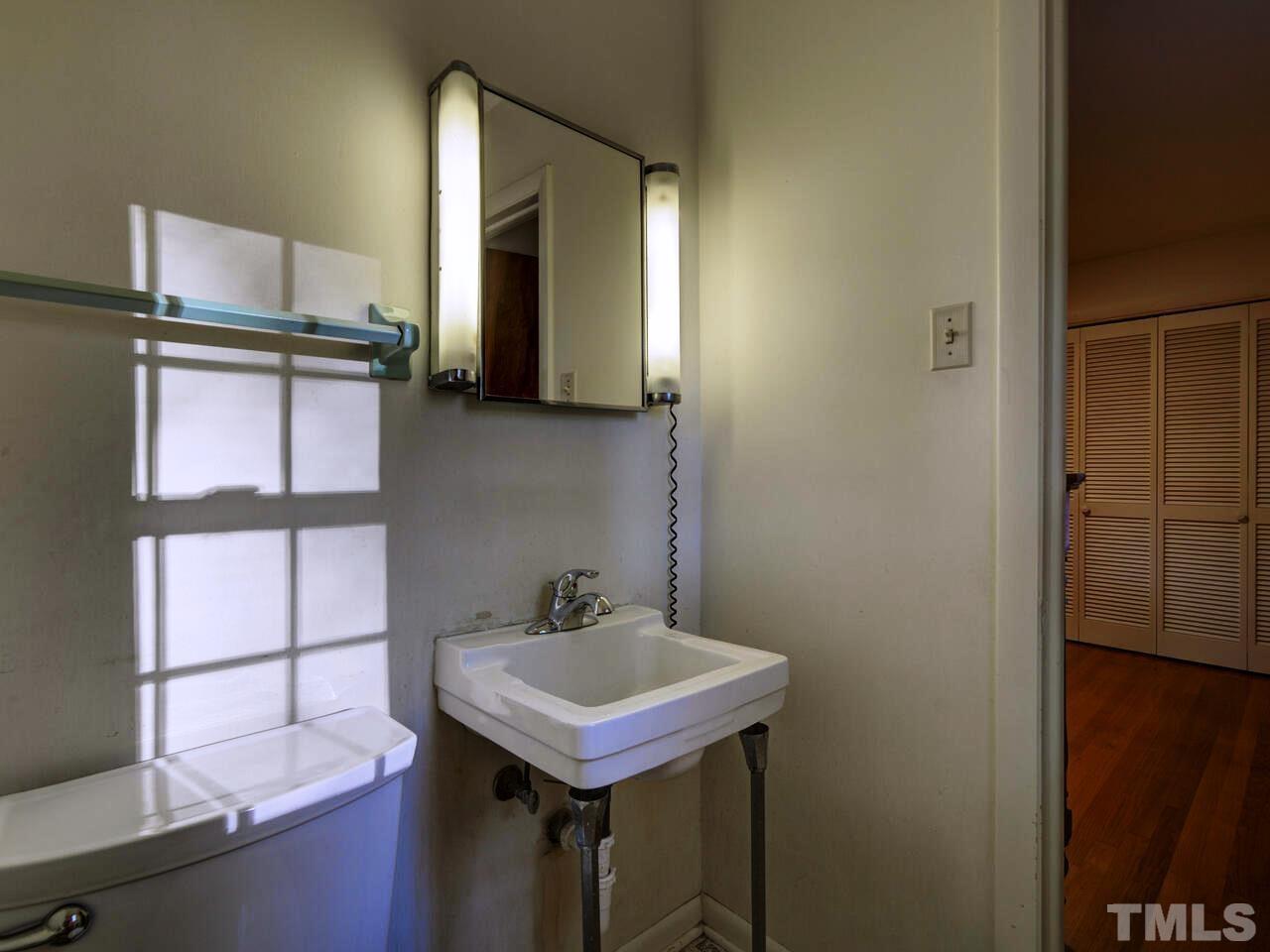 1305 Kingston Ridge Road Cary, NC 27511 - Photo 17 of 30 Half Bath that enters from Master and connects to the hall/Master Full Bath