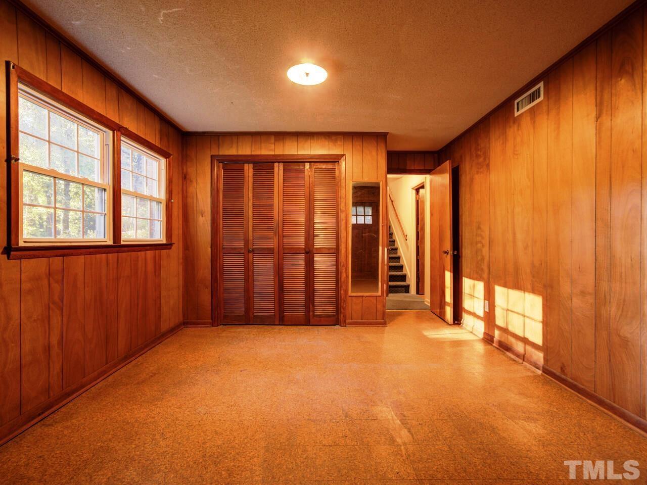 1305 Kingston Ridge Road Cary, NC 27511 - Photo 20 of 30 Lower Level with exit door to covered patio