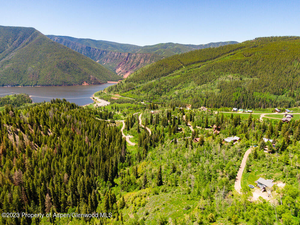 260 Wapiti Way Basalt, CO 81621 - Photo 12 of 20 a view of a lush green hillside and a building