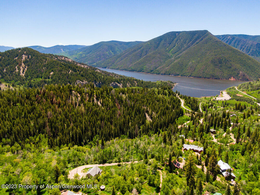 260 Wapiti Way Basalt, CO 81621 - Photo 15 of 20 a view of a lush green hillside and a houses