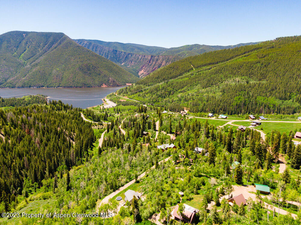 260 Wapiti Way Basalt, CO 81621 - Photo 17 of 20 a view of a lush green hillside and houses