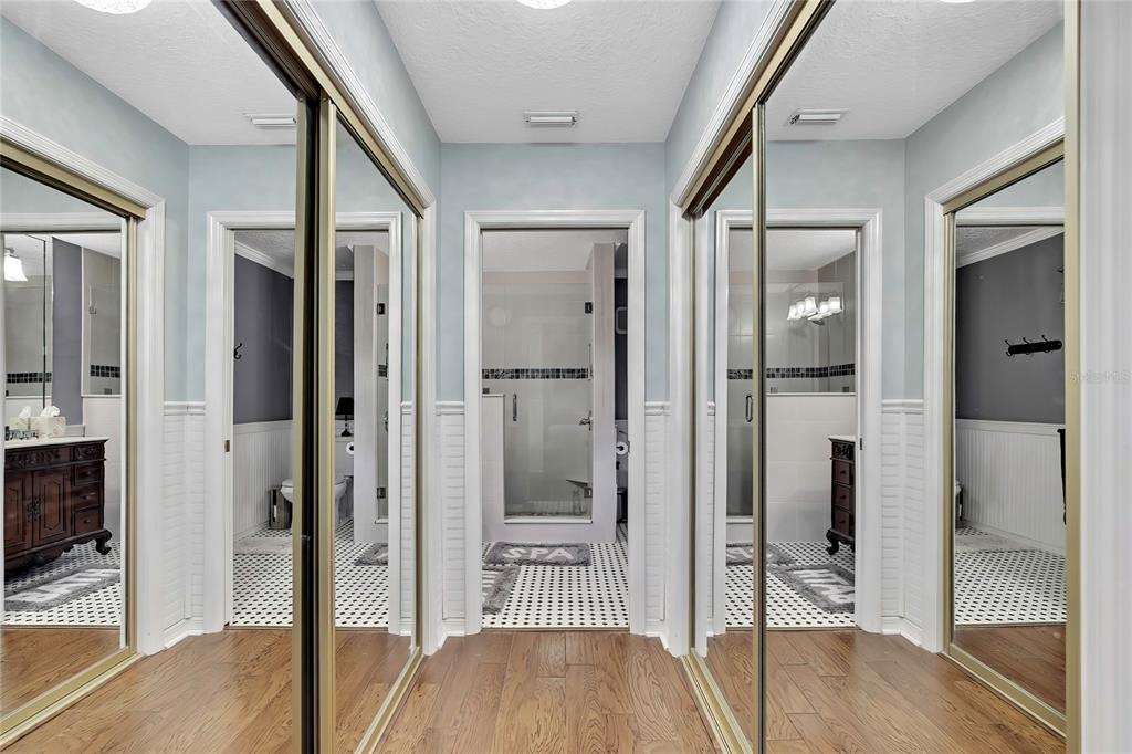 46 Greentree Street Homosassa, FL 34446 - Photo 17 of 49 a view of a hallway with wooden floor and living room