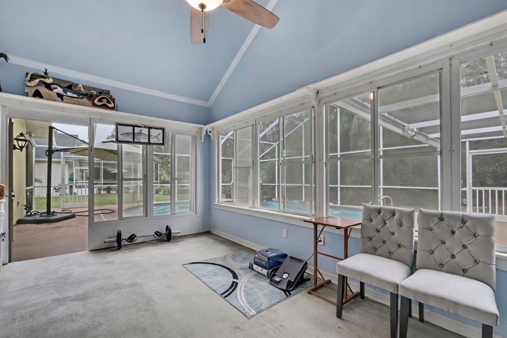 46 Greentree Street Homosassa, FL 34446 - Photo 30 of 49 a living room with furniture and a large window