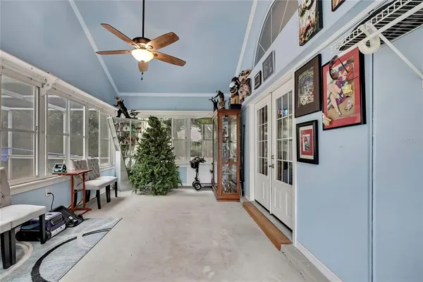 a view of a livingroom with furniture and windows