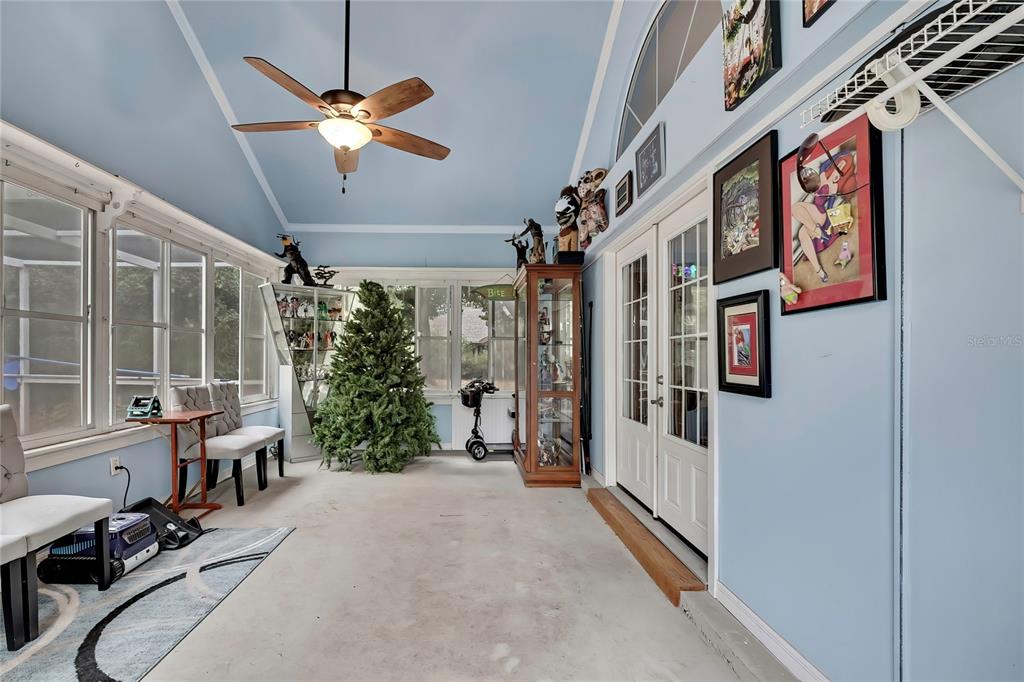46 Greentree Street Homosassa, FL 34446 - Photo 31 of 49 a view of a livingroom with furniture and windows