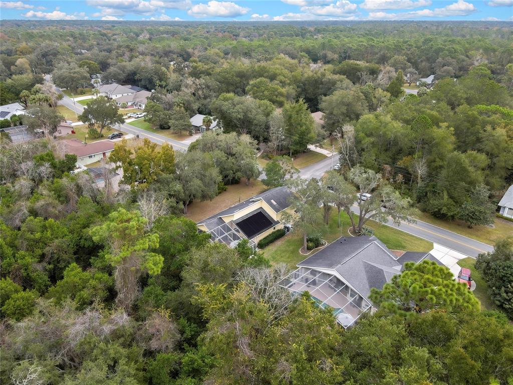 46 Greentree Street Homosassa, FL 34446 - Photo 48 of 49 an aerial view of a house with a yard