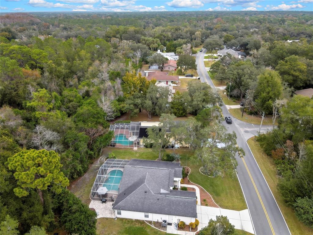 46 Greentree Street Homosassa, FL 34446 - Photo 49 of 49 an aerial view of residential houses with outdoor space and swimming pool