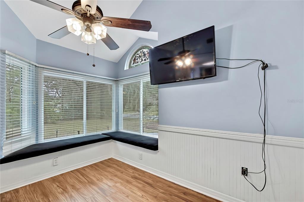 46 Greentree Street Homosassa, FL 34446 - Photo 10 of 49 a view of a livingroom with furniture and a flat screen tv