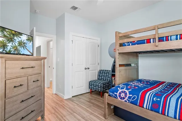 a living room with a bed and furniture