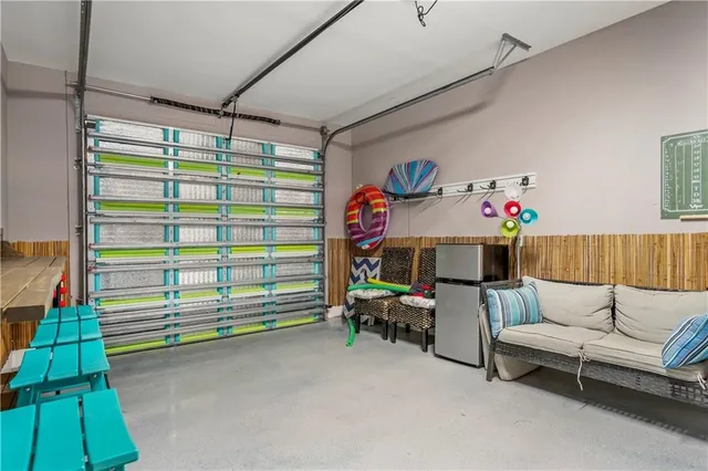 a view of front door and potted plants