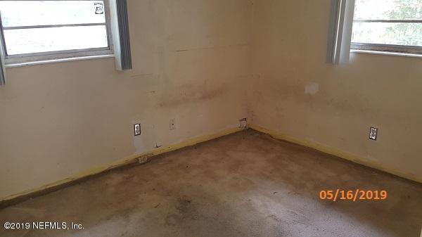 3322 Nancy Street Jacksonville, FL 32209 - Photo 13 of 13 an empty room with a window