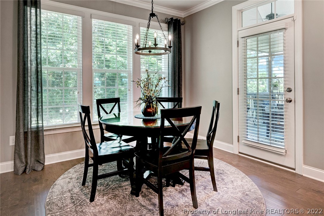 4139 Olde Judd Drive Willow Spring, NC 27592 - Photo 20 of 42 a view of a dining room with furniture window and outside view